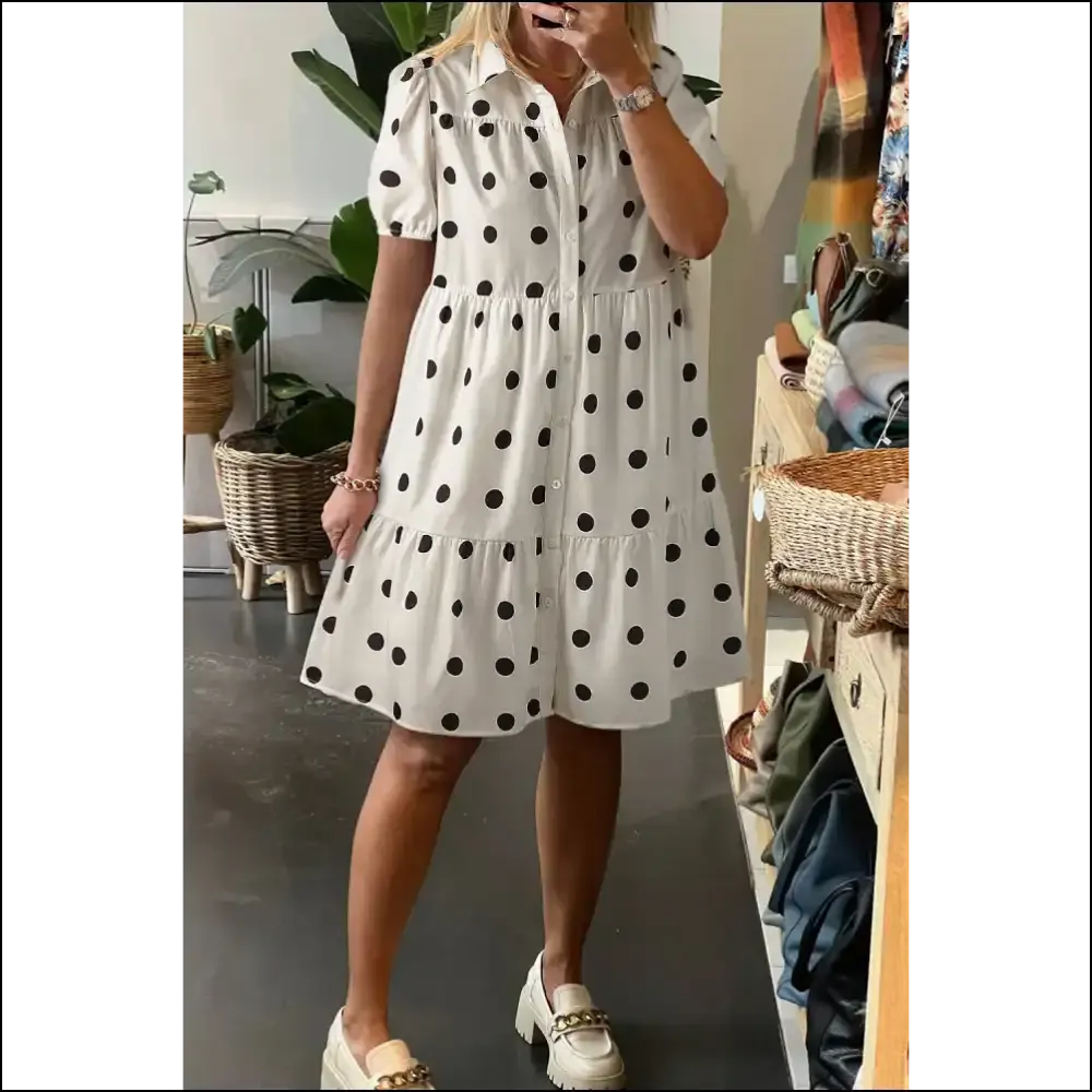 Chic White Polka Dot Dress: Warning, May Cause Excessive Twirling